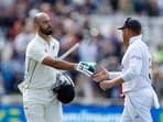 England v New Zealand - Trent Bridge, Nottingham, Britain - June 11, 2022 England's Jonny Bairstow shakes hands with New Zealand's Daryl Mitchell after he lost his wicket for 190 runs