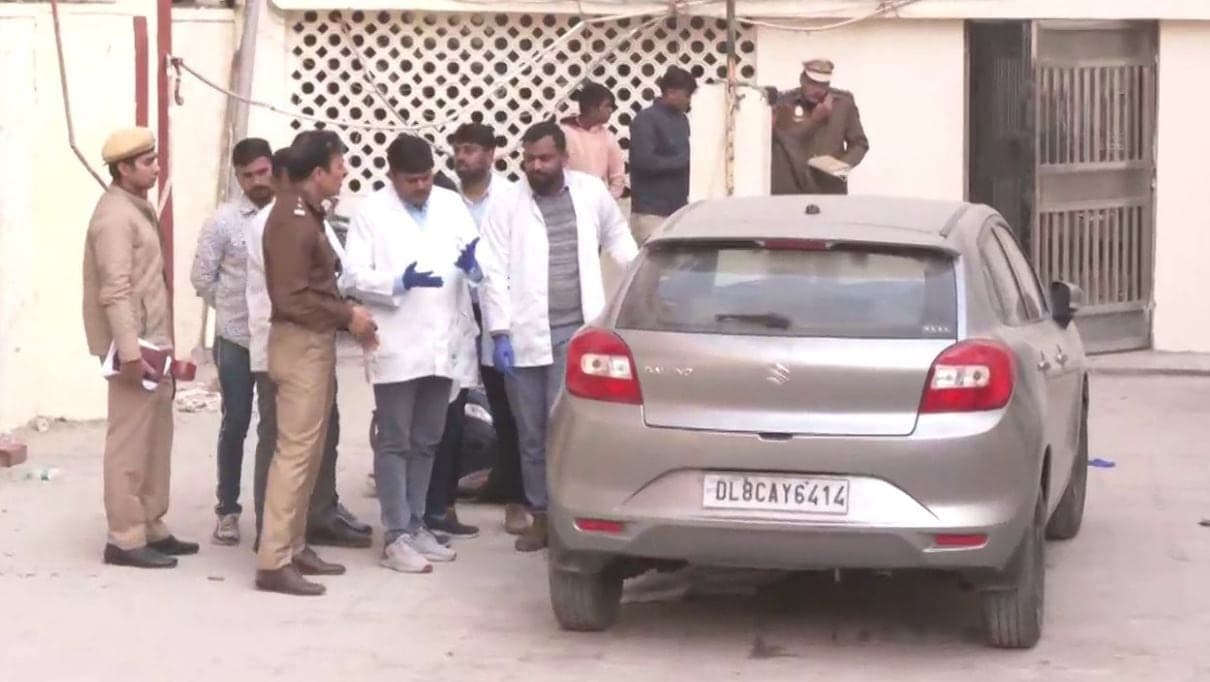 Forensic team along with the police team inspecting the car involved in Kanjhawala accident.  (ANI)