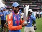India's Ravindra Jadeja celebrates with the trophy after winning the T20 World Cup.