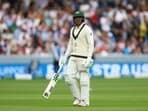 Cricket - Ashes - Second Test - England v Australia - Lords, London, Britain - July 1, 2023 Australia's Usman Khawaja  walks after losing his wicket, caught by England's Matthew Potts off the bowling of Stuart Broad Action Images via Reuters/Matthew Childs