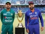 Pakistan captain Babar Azam and India skipper Rohit Sharma pose with Asia Cup trophy