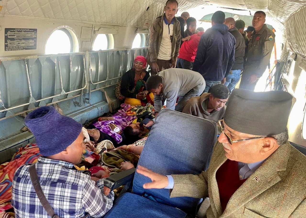 Nepal Prime Minister, Pushpa Kamal Dahal speaks to rescued people inside a helicopter after an earthquake in Jajarkot, Nepal, November 4, 2023.  (via REUTERS)