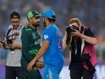 Pakistan's Babar Azam shakes hands with India's Rohit Sharma after India vs Pakistan match in Ahmedabad