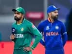 Babar Azam (L) and Virat Kohli during the 2021 T20 World Cup