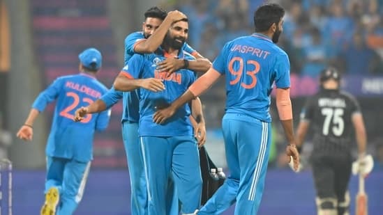 Mohammed Shami celebrates after taking the wicket of Daryl Mitchell during cricket world cup at Wankhede Stadium in Mumbai