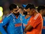 India coach Rahul Dravid and Virat Kohli look dejected during the presentation ceremony after losing the ICC Cricket World Cup final