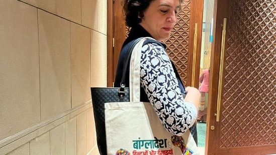 Congress MP carrying a tote bag with message over Bangladesh in it (X/@sridharramswamy)